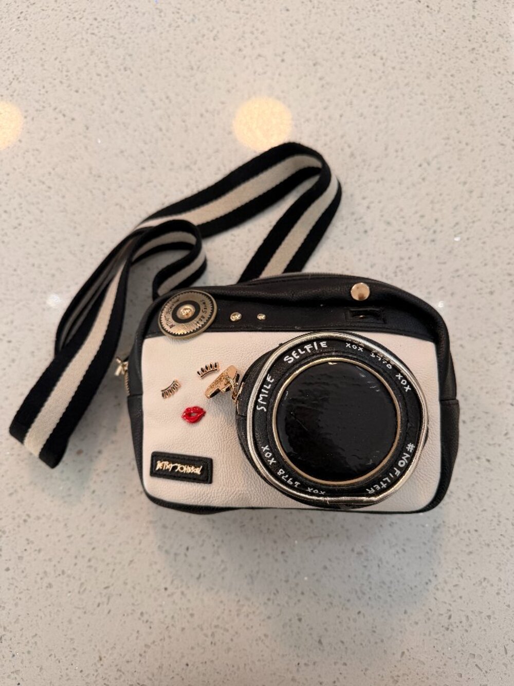 Betsey Johnson Snap Shot cream and black camera bag